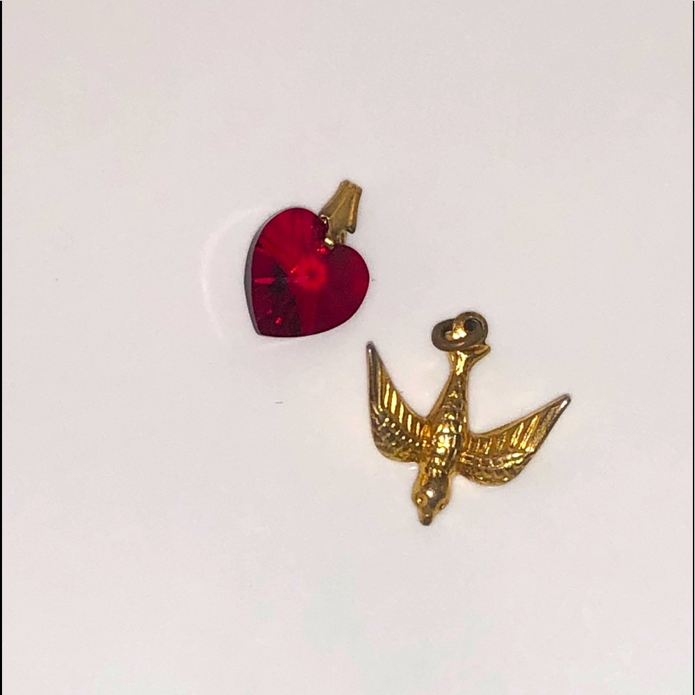 Two necklace pendants 🕊❤️